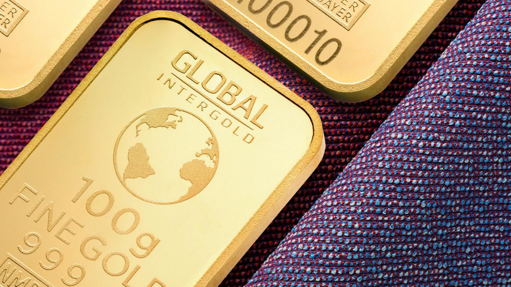 Close-up image of high-quality gold bars, symbolizing wealth and investment potential.